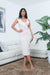 Sleeveless V Neck Bodycon Midi Dress with Asymmetrical Decorative Ruffle* (Y21018) - Wholesale Fashion Couture 