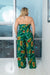 Plus Size 'Yacht Party' Multi Color Palms Print Open Front Flare Leg Halter Jumpsuit with Waist Tie (55GP16796-PLUS) Y - Wholesale Fashion Couture 